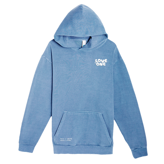 light blue hoodie with Love One written in white, left chest area